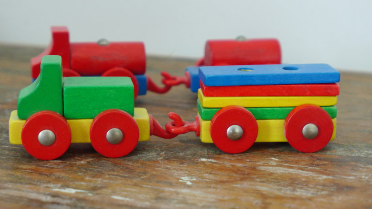 Two Vintage WOODEN TOY TRAINS with TWO GOODS WAGONS. Similar to Brio. 