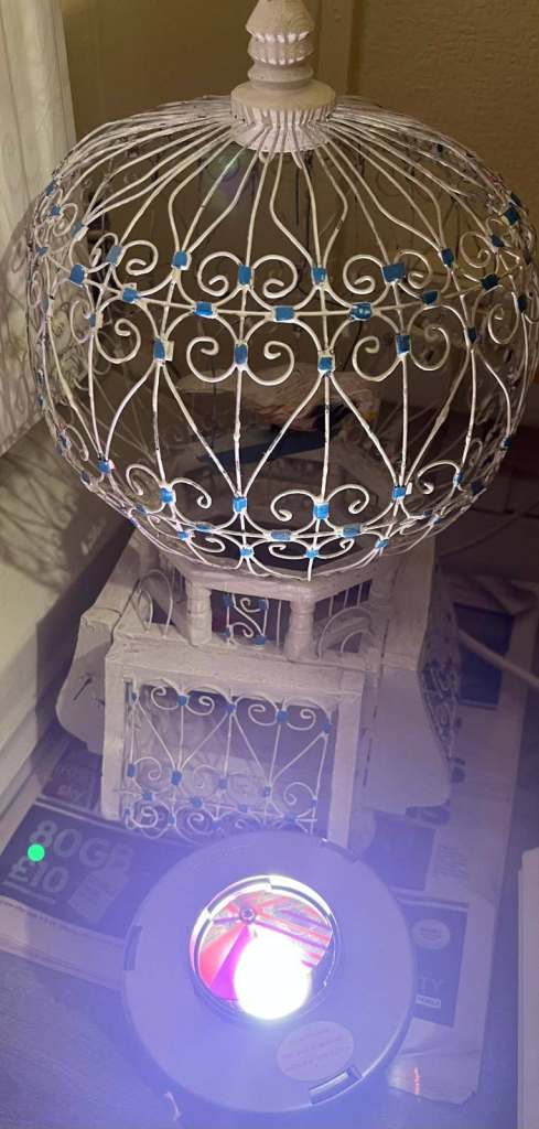 Bird or Pet cage, Mediterranean design cagem Hand made with a side turning multi colour light