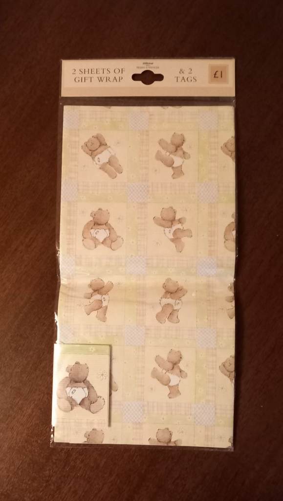 2 Sheets of Baby Gift Wrap & 2 Tags. 