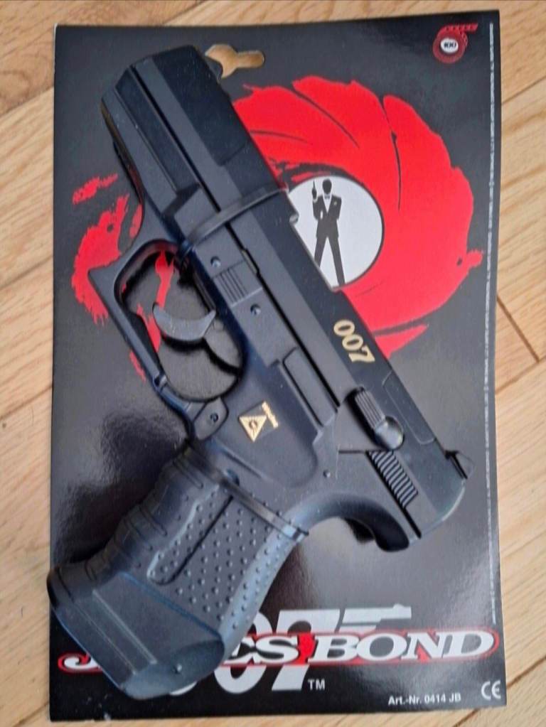 James Bond p99 ppk toy cap gun pistol with 1200 007 wicke paper caps will post rare 