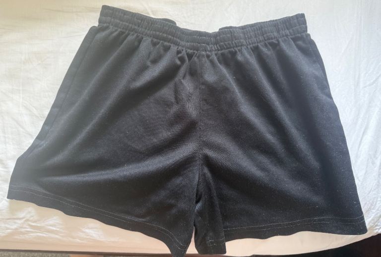 Unisex black shorts 8-9 years old 