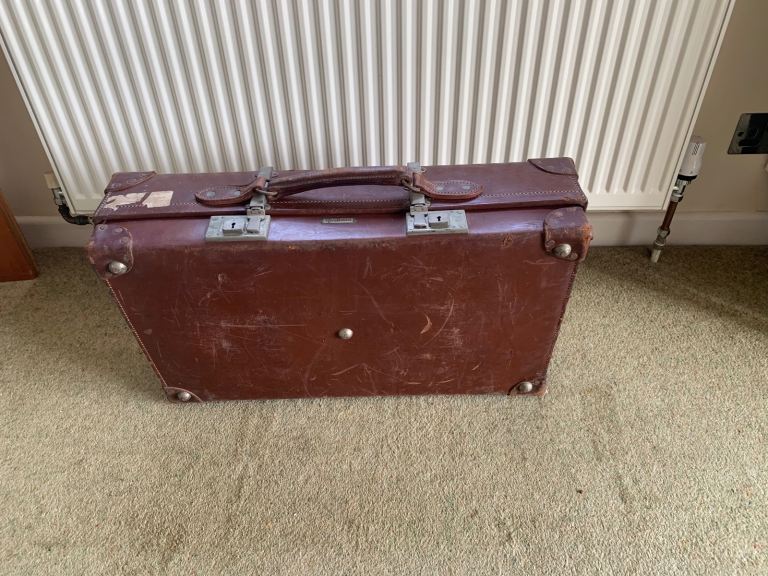 Antique sturdy leather suitcase