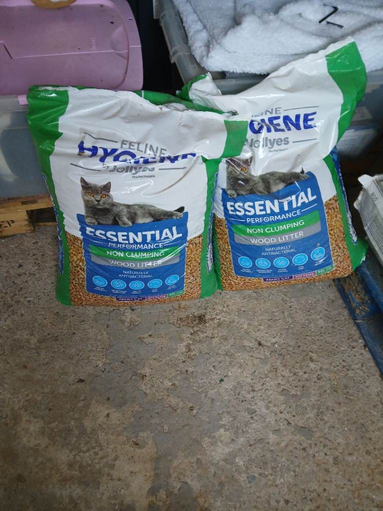 2 huge bags of cat litter pellets wood