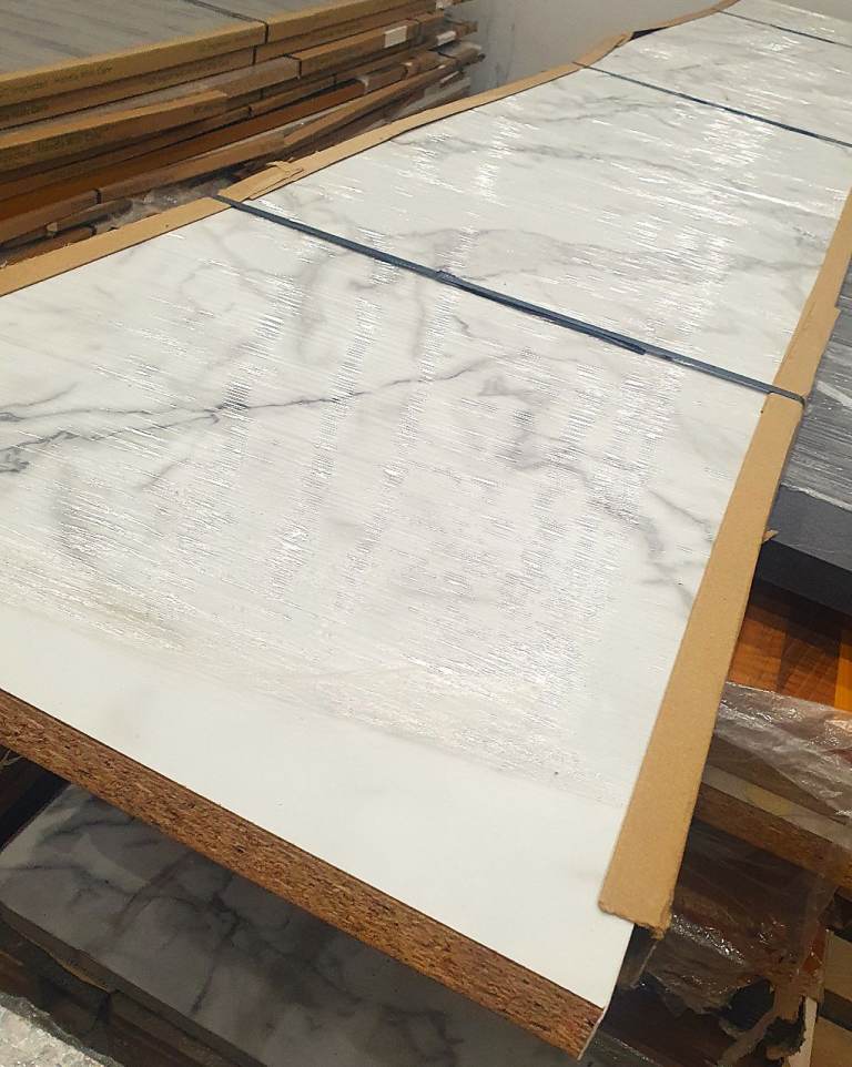 Wren Luxury Laminate Kitchen Worktops and TekWall in Calacatta Cloud Gloss. Brand New