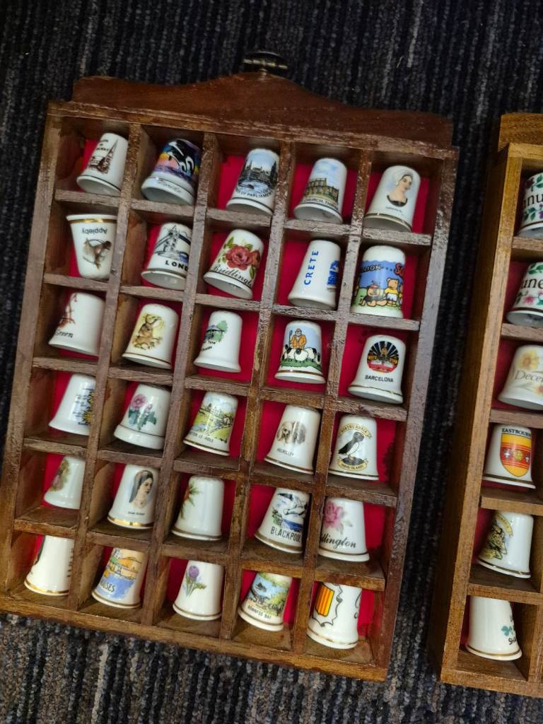 Antique thimble rack and thimbles