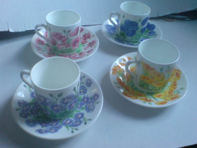 SET OF 4 M&S CUPS AND SAUCERS