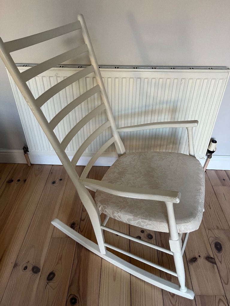 White wooden rocking chair 