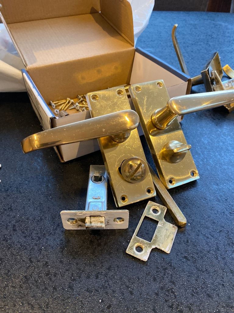 Brass locking bathroom door handles