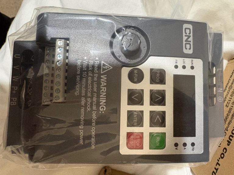 Variable Frequency Drive (VFD), specifically a CNC Electric IST230A-S22B.