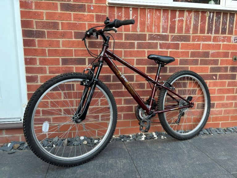 Apollo Bike with front suspension 26” tyres.