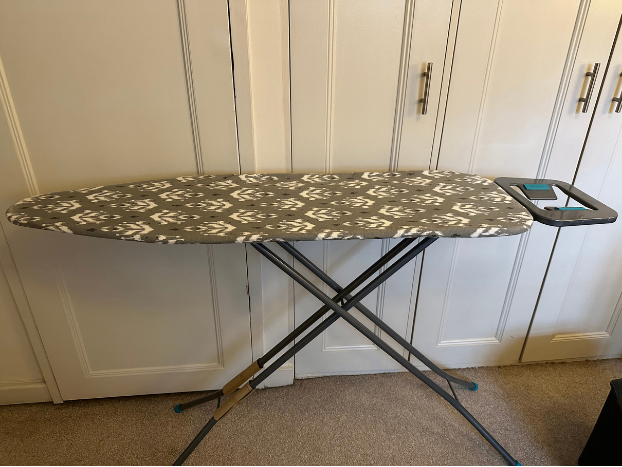 Grey Ironing Board with Patterned Cover – Good Condition