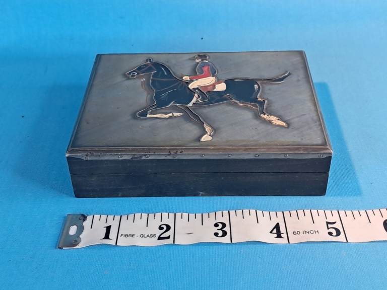 Vintage rectangular box.1960 s.image on the lid shows a horse and rider in mid-jump.