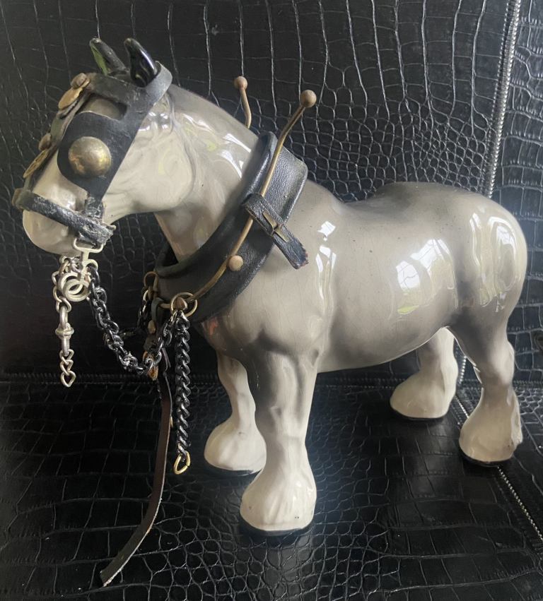 Shire horse and wall hanging