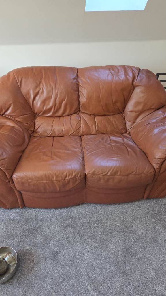 Free leather sofa good condition 