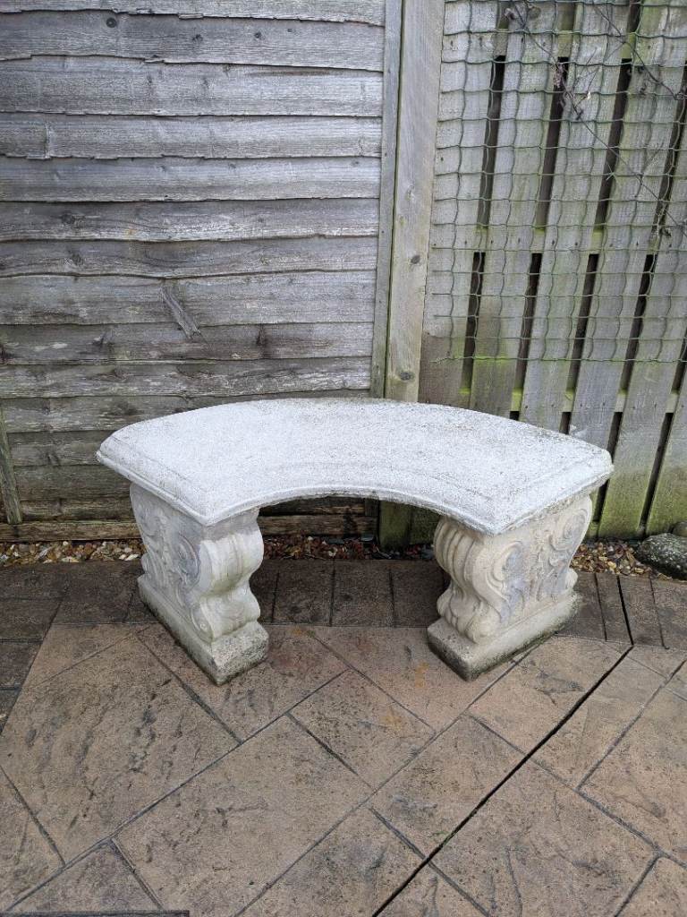 Stone ornamental curved garden bench 