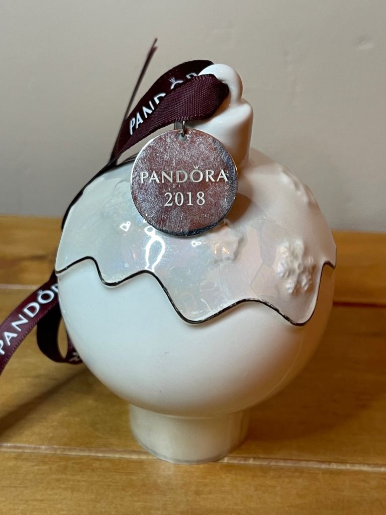 image for Pandora 2018 Ceramic Christmas pud bauble 2018 with purple ribbon and snowflake detail.