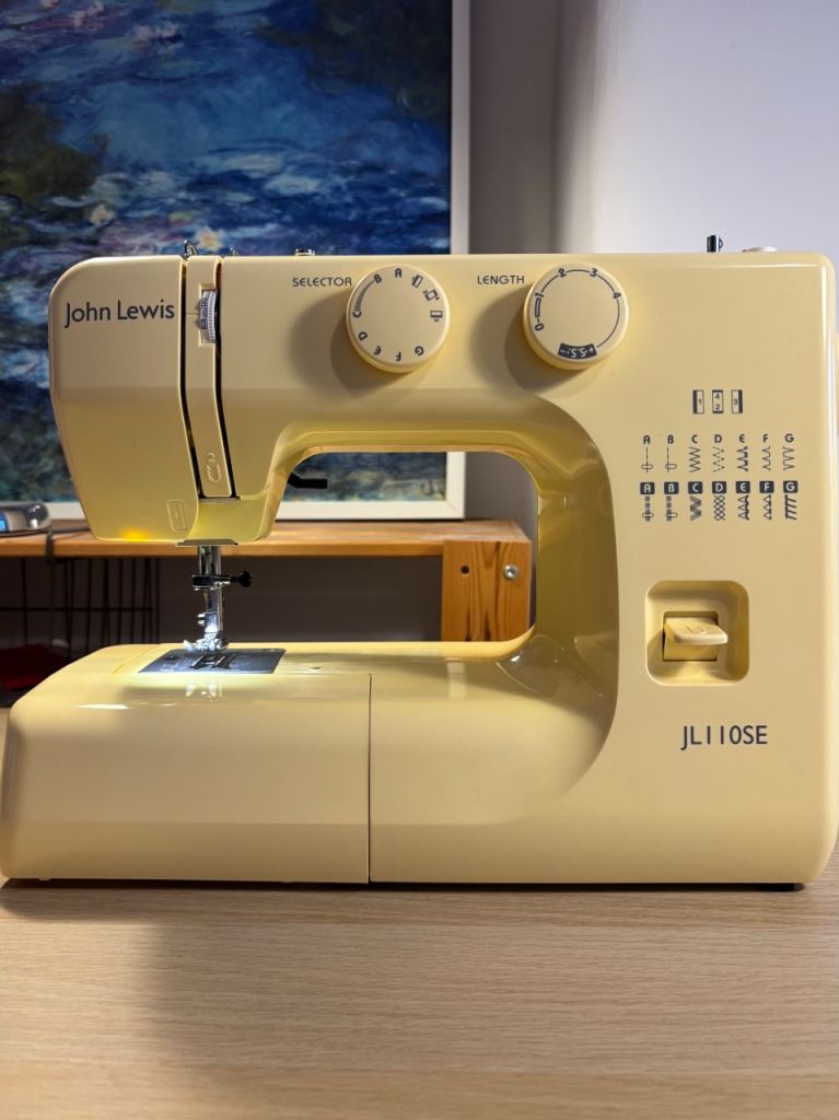 John Lewis JL110SE yellow sewing machine