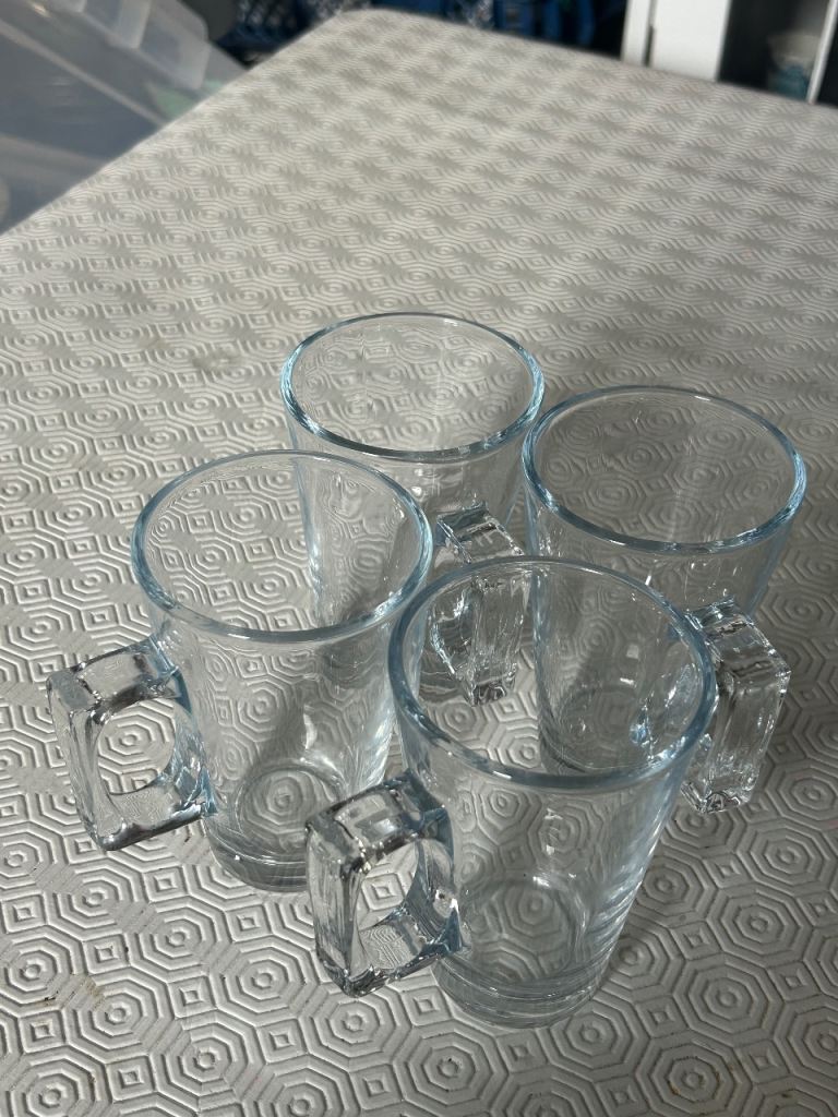 Set of 4 clear glass mugs with handles