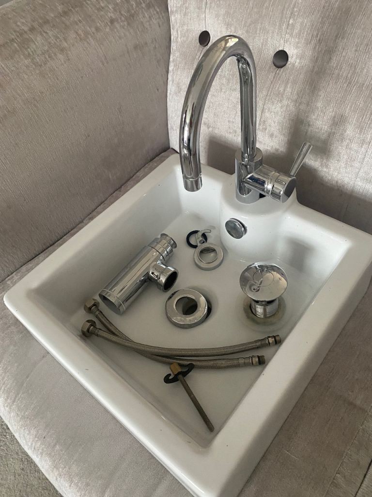 Wally wash hand basin with taps