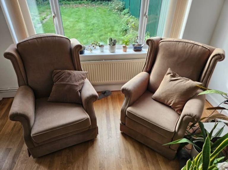 Two wingback armchairs (1 recliner)