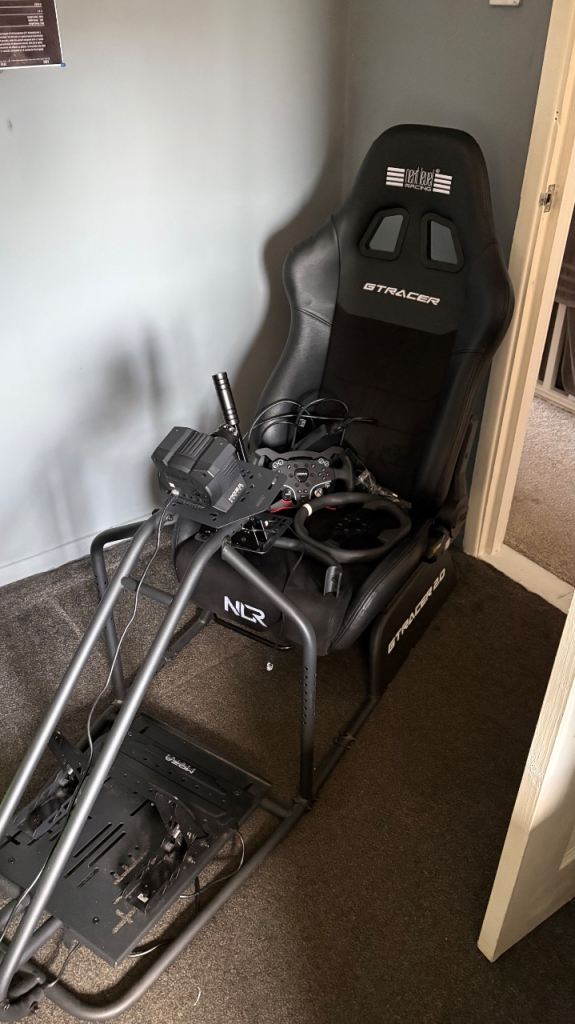Racing cockpit with wheel 