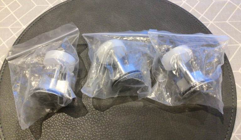 THREE CHROMED POP-UP WASTE PLUGS