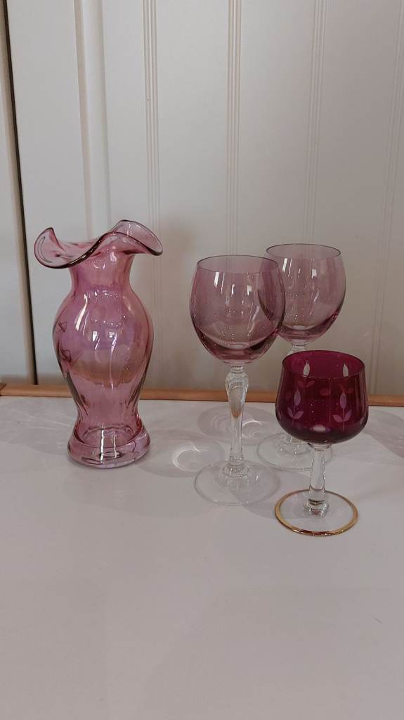 beautiful cranberry pink coloured glass items  from Caithness crystal glass  handmade in Scotland 