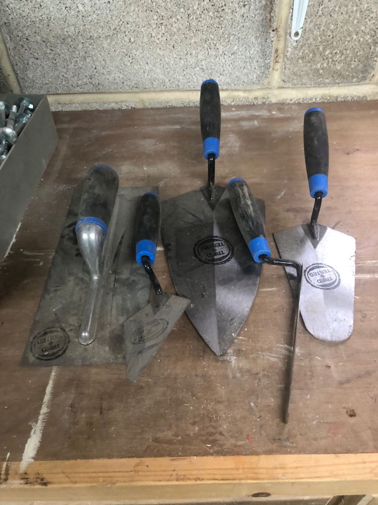 Bricklayers hand trowels.