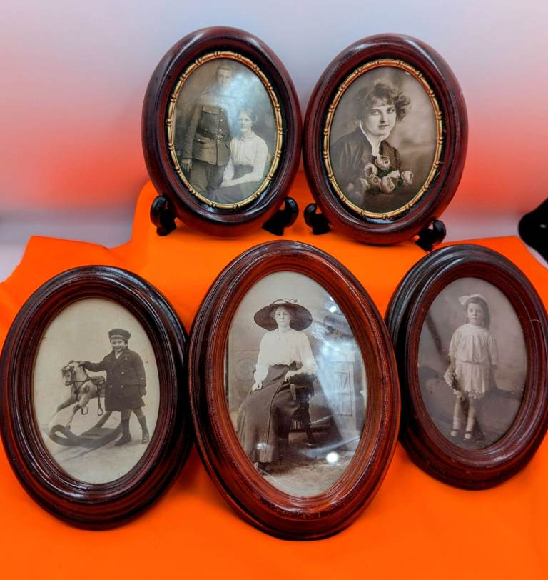 Five Oval Wooden Photo Frames with early 20th photographs