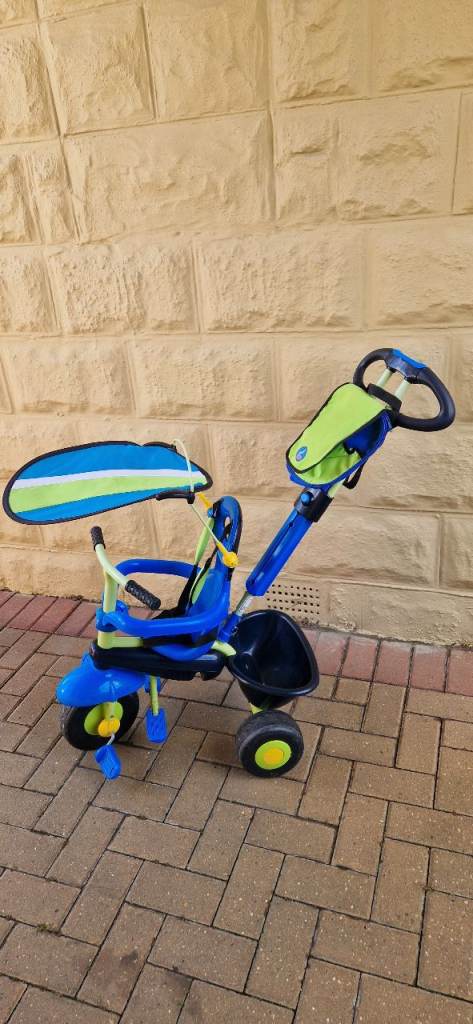 SMART TRIKE 3 IN 1 TRICYCLE WITH CANOPY AND STORAGE BAG. VERY GOOD CONDITION.