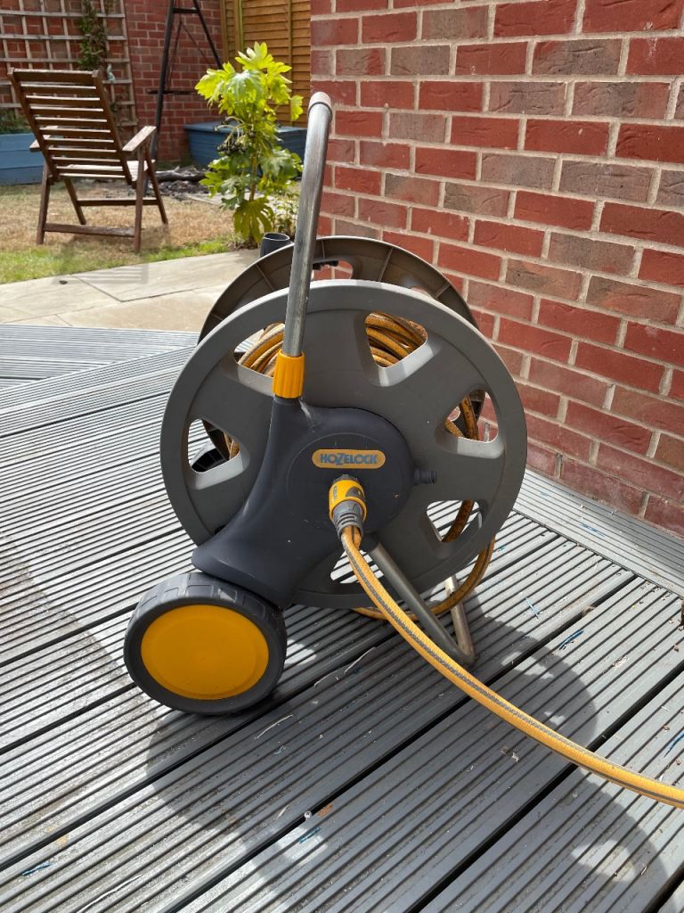 Hozelock hosepipe and reel on wheels