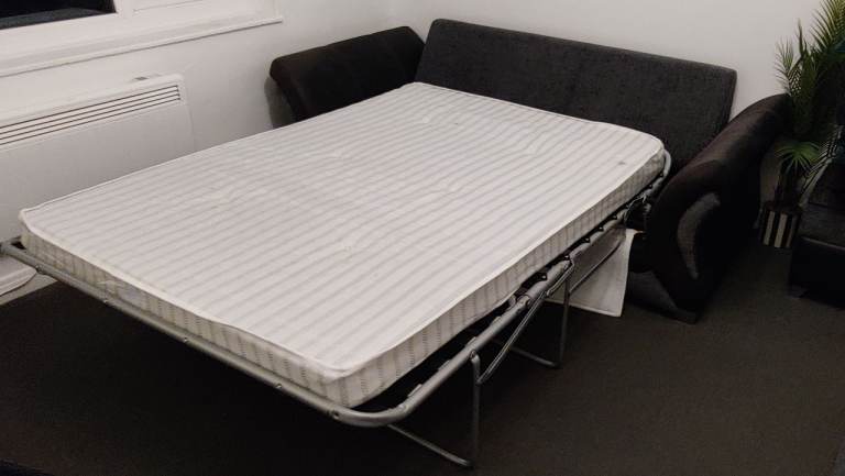 3 Seater Sofa Bed + Footstall - selling due to moving abroad