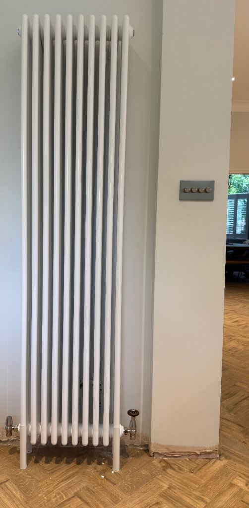 Vertical traditional white 4 column radiator with feet
