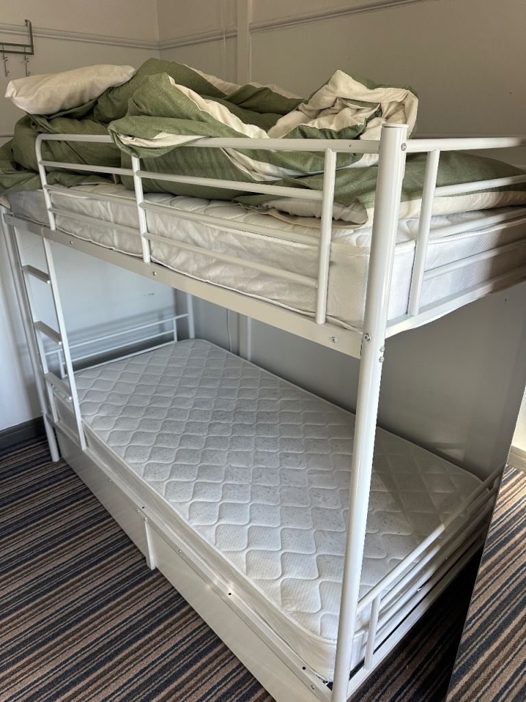 Pair of bunk beds with ladder and 2 mattresses as new 