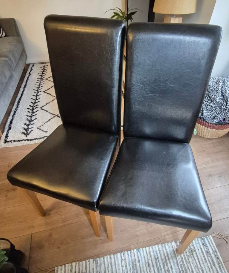 2 x faux leather black dining chairs