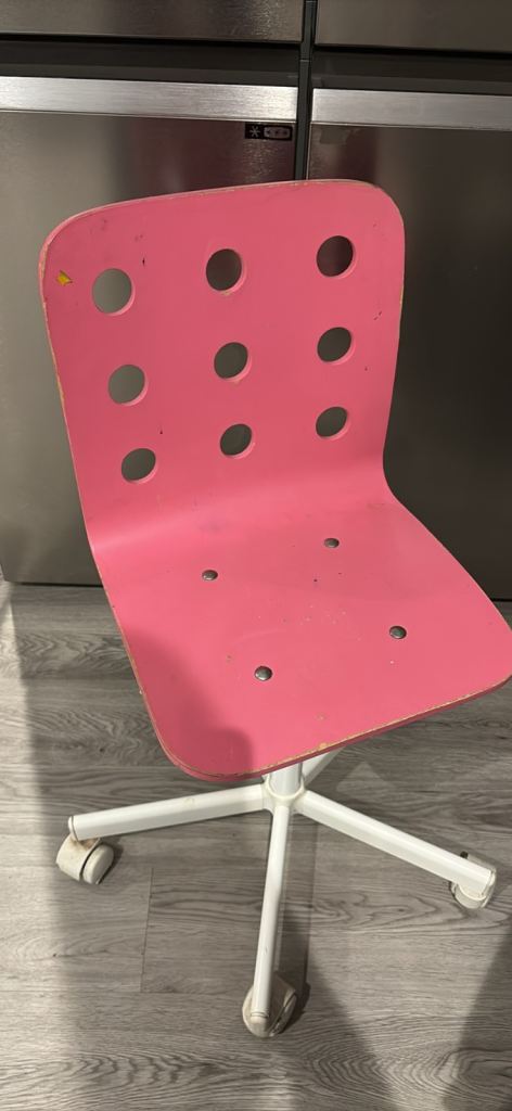 Pink chair on wheels