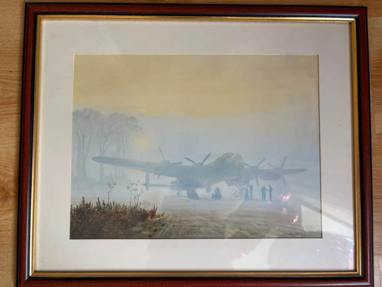 Two framed aviation pictures 