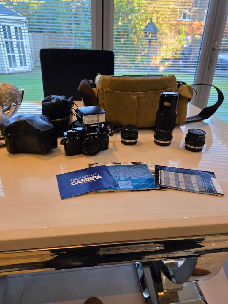 Olympus om10 camera body flash, lenses 
