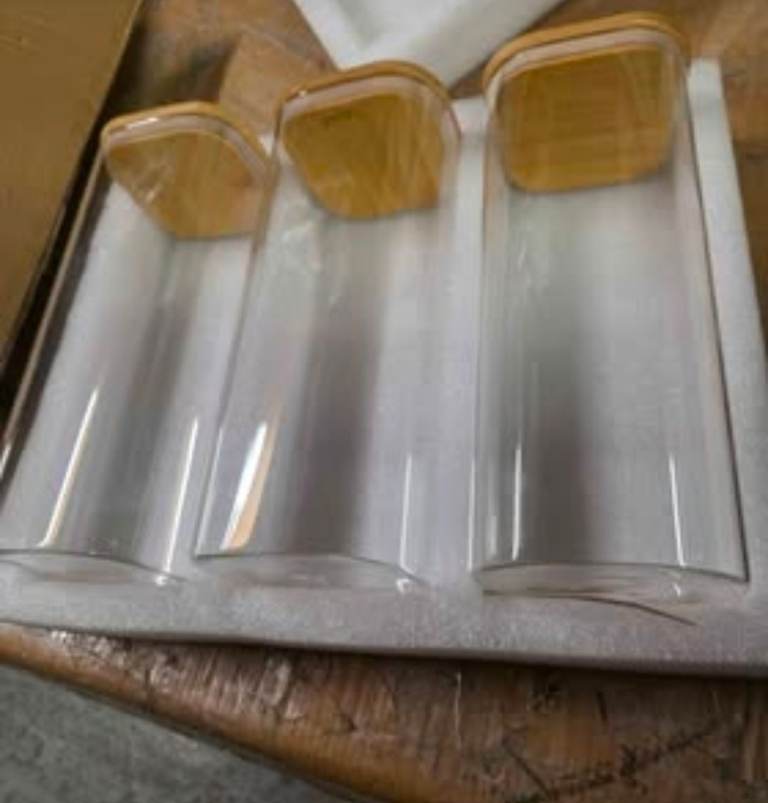 A new set of 3 clear glass pasta ,cearal etc with wood tops the measurements 