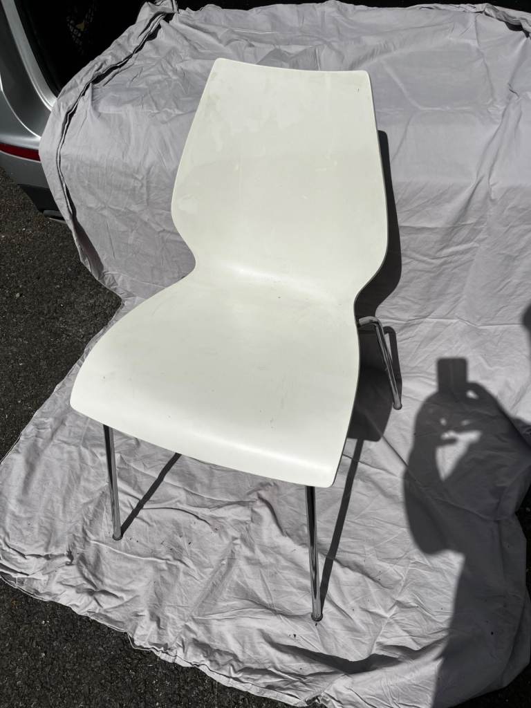 Kartell Maui chairs by Vico Magistretti