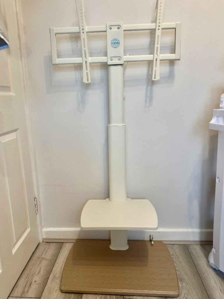 Adjustable TV Stand holds up to 65” 