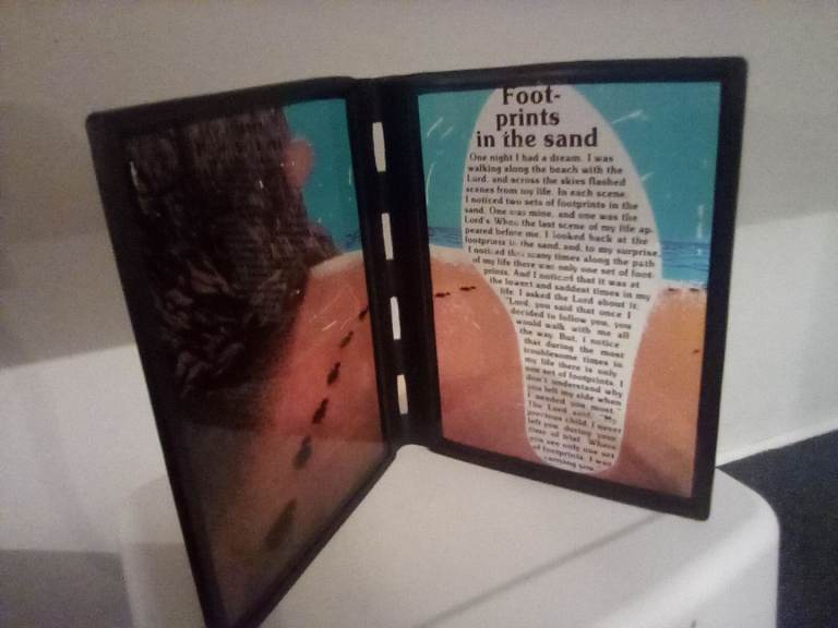 Stained glass poem of footprints in the sand. New