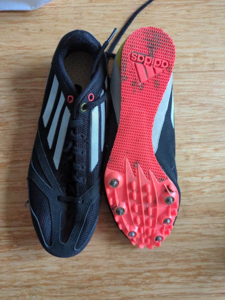 Spike running shoes size 6