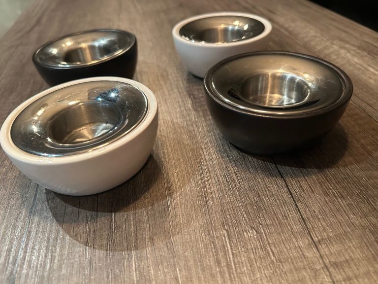 Ceramic and stainless tea light candle holders 