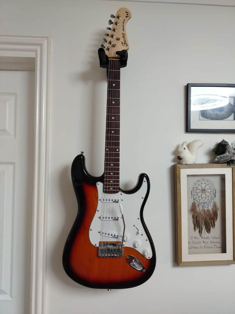 image for Fazley S style starter guitar VGC