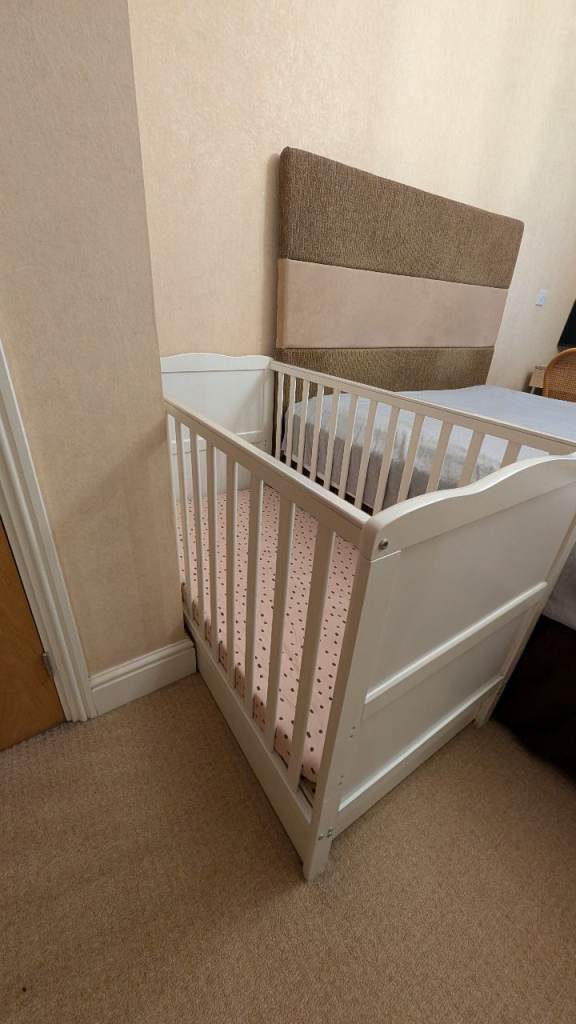Cot bed with mattress