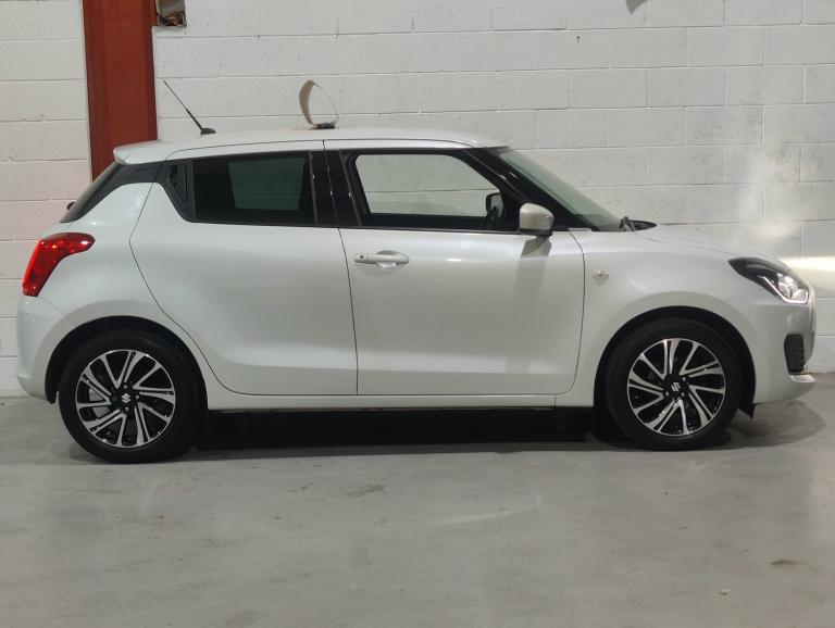 SUZUKI SWIFT; 1.2 PETROL HYBRID; 82BHP; SZ-L; 5 DOOR; MANUAL; WHITE; 57.9 MPG;