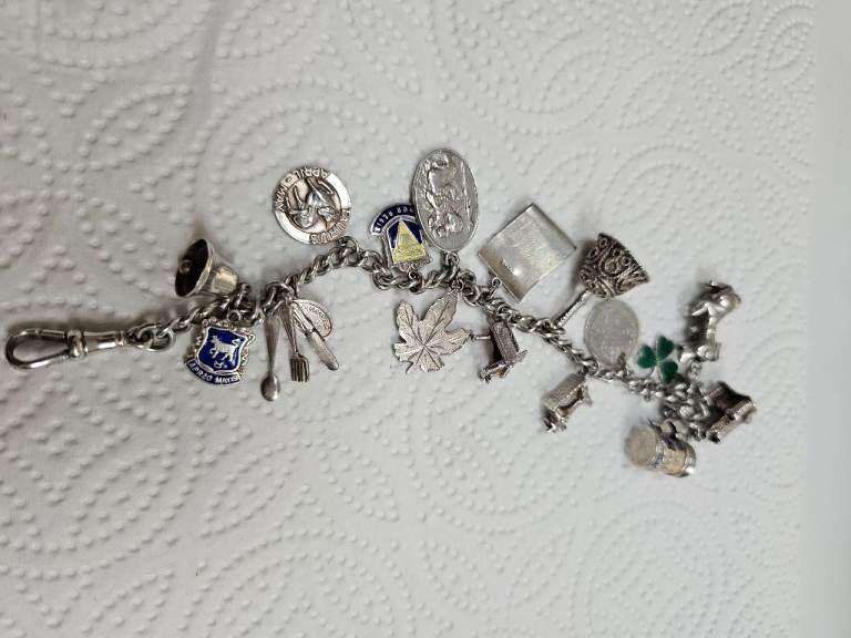 Vintage Silver Charm Bracelet with Various Charms
