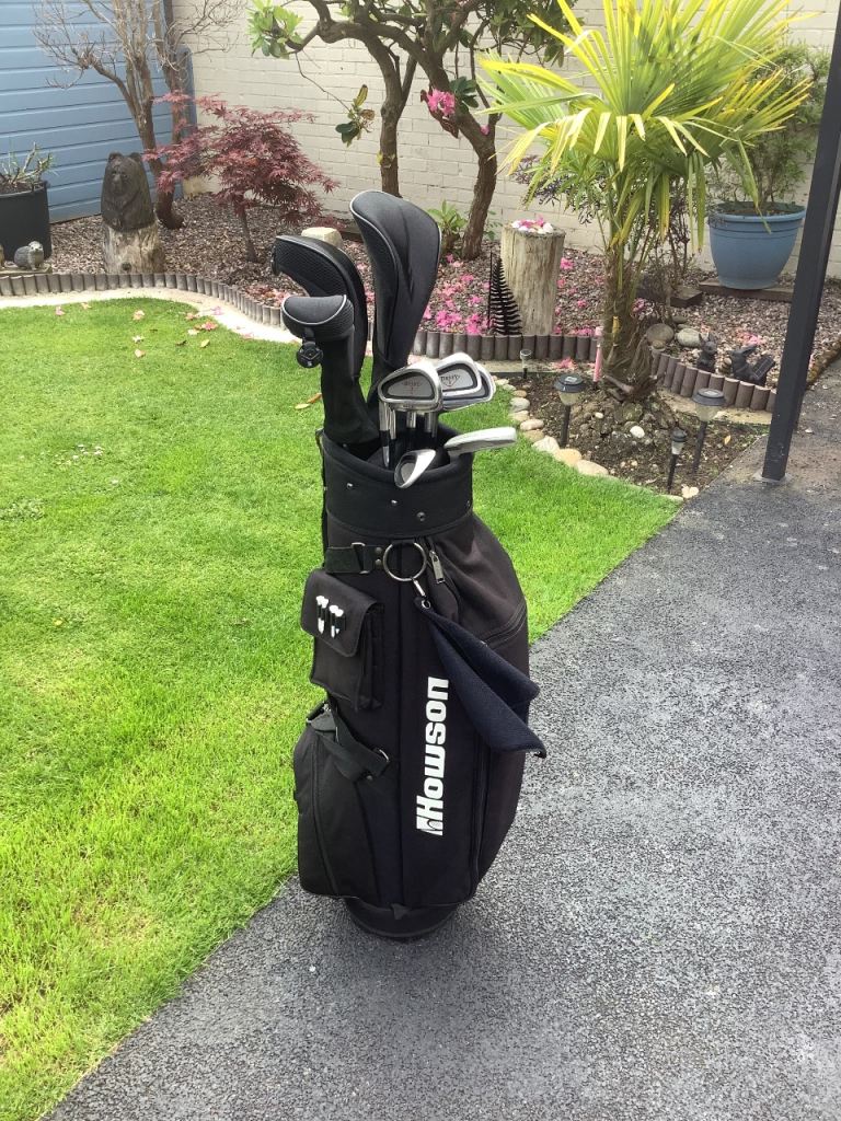 Set of Left Hand Howson Derby 2 golf clubs, in a lovely black canvas Howson golf bag.