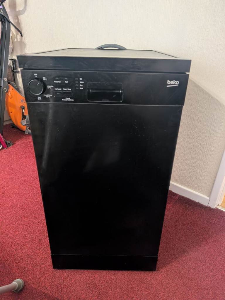 Beko Slimline Dishwasher model DFS04010B